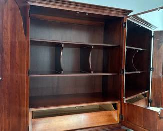 B10 - $100. Pennsylvania House Armoire. A few minor imperfections at feet.  Minimal scratches and dings. Measures 39" wide x18.5" deep x 66" tall.