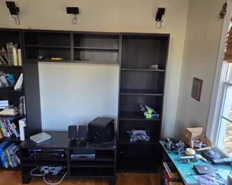 B130 - $50. Media Stand with Bookcase Surround. 