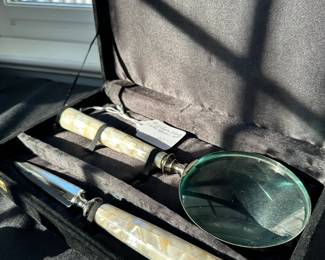 B24 - $60.  Mother of Pearl Desk components.  Magnifying Glass and Letter opener.  Carrying case included. 