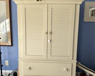 B38 - $75.  Broyhill Armoire Like new condition.  Measures 42" wide 19" deep x 64" tall. 
