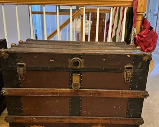 B28 - $30. Vintage Steamer Trunk.  Some scratches and chips in finish lots of life left in this storage staple.  Measures 35"Wx20"Dx22"T
