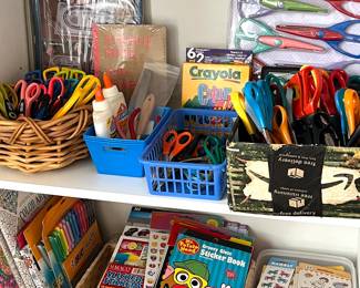 Scrapbooking, scissors, stickers galore, and sticker books!