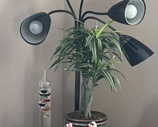 Glass barometer, artificial plant, and signed J Wagner design “Maxine” with quote