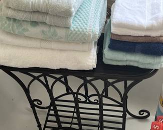 Cute iron side table (2) and assorted new towels