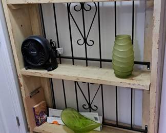 Large shelf with wrought iron feature in back
