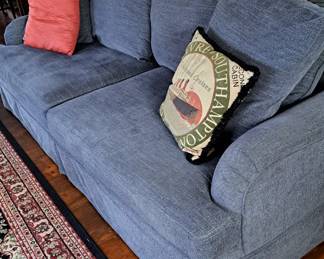 Big two-cushion sofa with three across back; gray and  only 2 years old