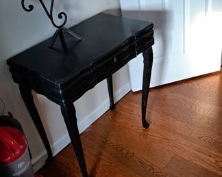 Table, opens to reveal lined drawer for silverware