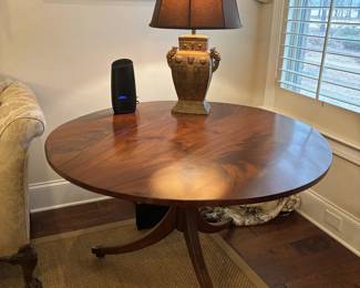 Excellent Round Flame Mahogany Tilt Top Breakfast Table with Pedestal Base and Brass Toe Caps