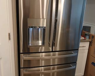 Stainless steel refrigerator (needs repair to freezer drawer.)