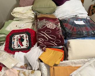 Spreads, quilts, pillows, table clothes, napkins, etc.