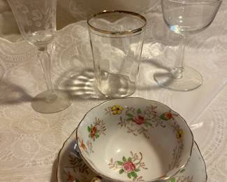 Tea and cup set (4).   Six Gold rimmed Glasses . Over 10 different sets of glassware.  More glassware, punch bowls and glasses, and dish sets not shown.