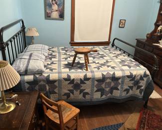 Quilts and metal bed