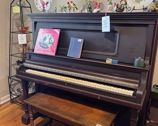 piano, bird figurines and plates