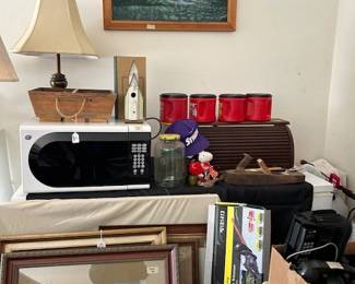 microwave, hedge trimmer, bread box, artwork