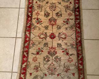 Handknotted small rug 