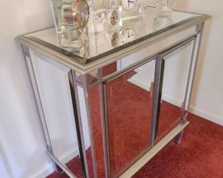 Mirrored stand, 2 doors, shelves