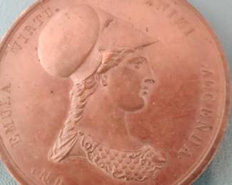 Bronze medallions, one of many