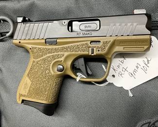 four magazines, a holster,