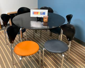 Niels Jorgensen Haugesen Danish Round Table and Six Chairs. Table comes with two additional leaves.