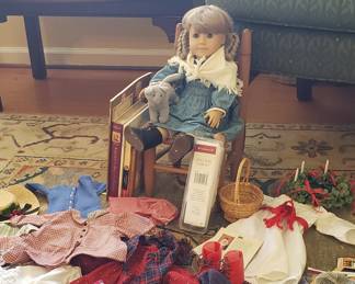 original American Girl doll Kirsten with several outfits, shoes, books and more; $150