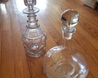 Glass decanters; on left Early 19th century Anglo-Irish cut glass $80... on right Vintage glass decanter with ship etching $35