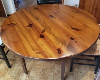 Beautiful pine kitchen table; $200. 4 kitchen chairs; $40 each.