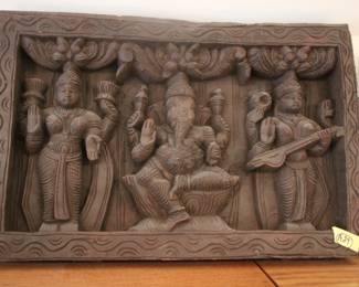 Carved wood Hindu plaque