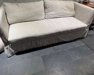 #61 - $400. - Duh sofa, linen, down pillows. 