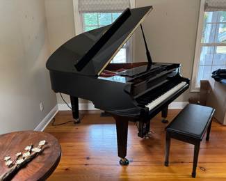 Yamaha baby grand piano - C2 model Conservatory - Black polished . Very clean. case is in mint condition . Has a player piano. $21,500