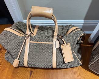 #111- $180 - Coach Signature duffle bag 