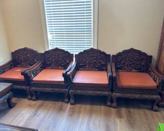 #39 4 chairs from Japan with loose cushions, hand carved back with elephants, 27"x 25" $400.00