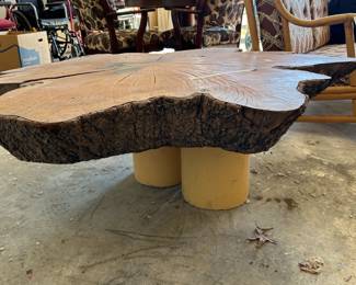 #96 live edge coffee table on ceramic base 55" round, 7" thick for top, base to top 18.5" tall $200.00