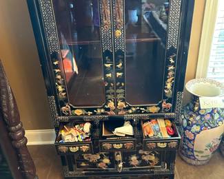 #3 black lacquered mother of pearl Asian display cabinet with 2 glass doors and 2 wood doors, 3 drawers, as is leg broken, 30x16.5x75 $275.00