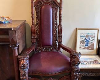 #58 lion head carved chair, 29x72 $300.00