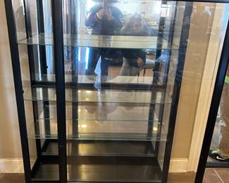 #8 black painted, beveled glass display cabinet with sliding front and 3 glass shelves, 42x15x60 $200.00