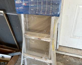 #91 warner multi ladder, telescoping holds 300 pounds $200.00