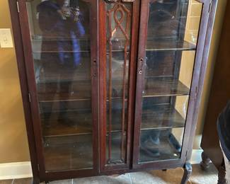 #2 antique display cabinet as is chipped veneer, 2 glass doors, on queen Anne legs 42x15.5x58 $125.00