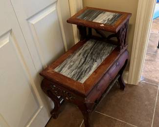 #61 step end table with marble top with carved front and Queen Anne legs, as is - finish 14x22x28 $125.00