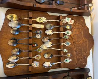 #165 spoon stand with 16 spoons, stand is wood carved $25.00