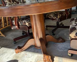 #97 round pedestal table with claw feet with 4 rolling chairs with cigars and pipes pattern 45x28 $200.00