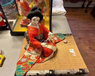 #145 Asian geisha doll sitting on grass mat, 10" tall $40.00