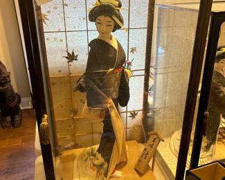 #140 Asian geisha doll, 22" tall in glass case 16x13x27 $75.00