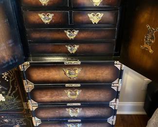 #30 Asian cabinet, 5 drawer, 2 doors with 6 drawers behind doors with handles on the side. As is scratch in finish $325.00