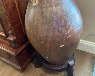 #44 antique pottery vase on wooden stand, 28" tall $120.00