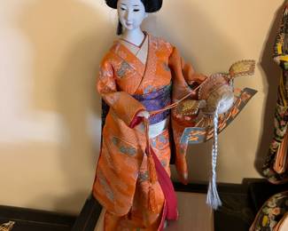 #138 asian doll with orange kimono, 17" tall $30.00