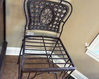 #10 metal chair with wicker back, 22" tall $40.00