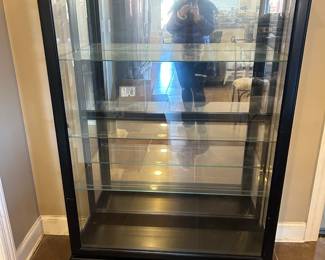 #8	black painted, beveled glass display cabinet with sliding front and  3 glass shelves, 42x15x60	 $200.00 			
