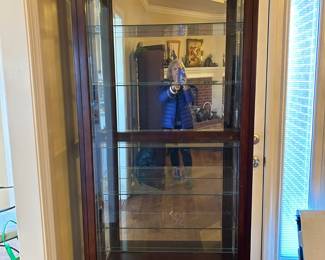 #11 lighted display cabinet with beveled glass with sliding front and 5 glass shelves, 34x13x80 $225.00