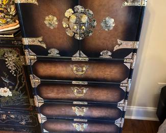 #30 Asian cabinet, 5 drawer, 2 doors with 6 drawers behind doors with handles on the side. As is scratch in finish $325.00