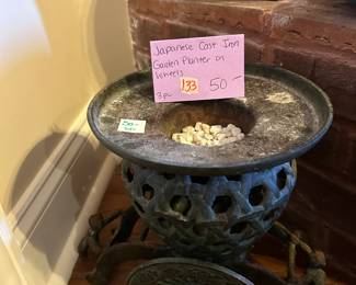 #133 Japanese cast iron garden planter on wheels $50.00